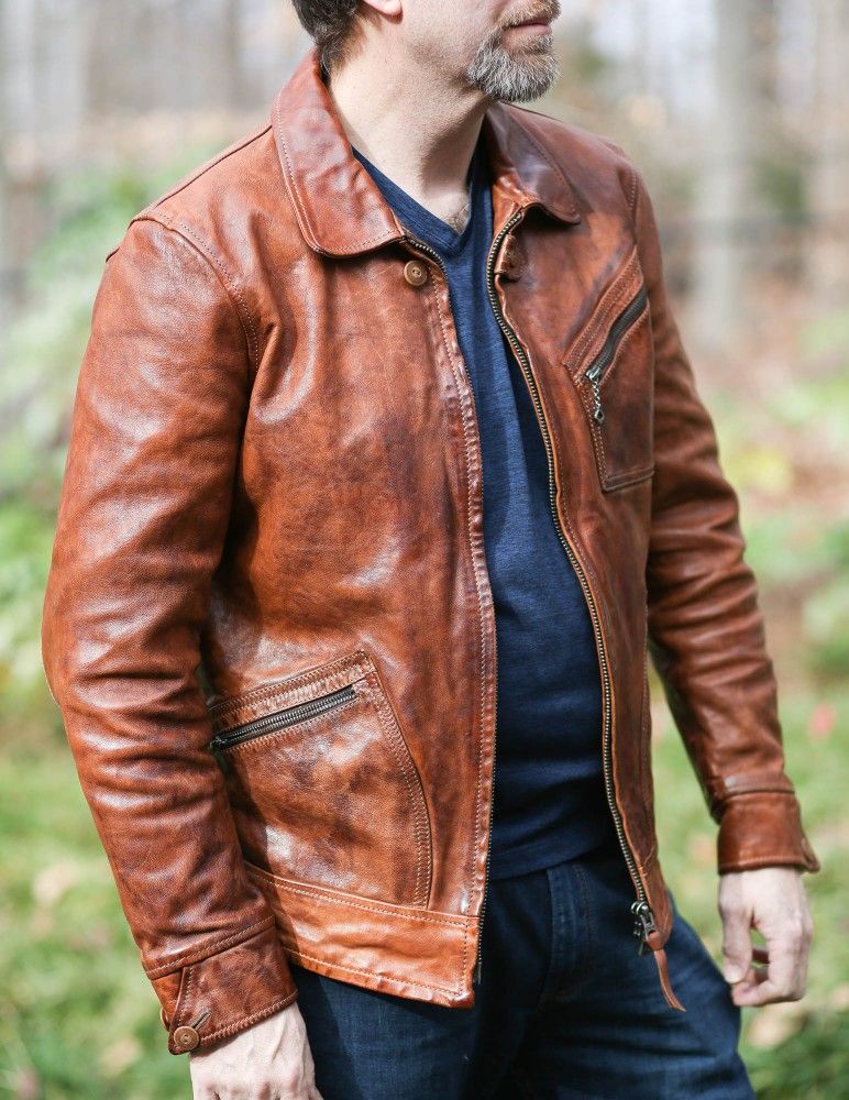  "Close-up of a real leather jacket, showcasing its texture and quality