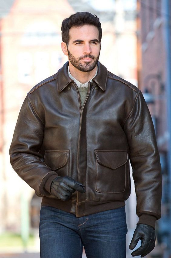 Person wearing a real leather jacket, looking confident and stylish in a urban setting"